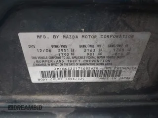 2007 Mazda 3 s Touring with VIN JM1BK323171682628, listed as a IAAI auction lot 42084597 with 172,047 mi miles. Bid and sale history available at carsss.com. Image 9.