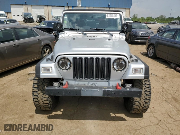 2002 Jeep Wrangler X с VIN 1J4FA39S52P770423, выставлен на аукционе Copart как лот 62498885 с пробегом 87 433 миль миль и Чистый • Clean title. История ставок и продаж доступна на DreamBid. Изображение 5.