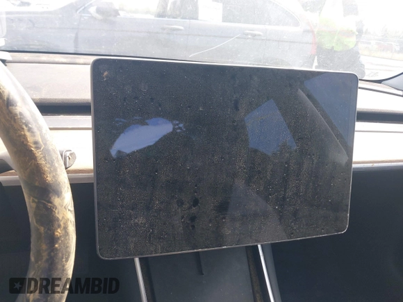 2019 Tesla Model 3 Mid Range with VIN 5YJ3E1EA0KF394514, listed as a IAAI auction lot 42080985 with Not Provided miles and . Bid and sale history available at DreamBid. Image 7.
