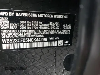 2022 BMW iX xDrive50 z VIN WB523CF05NCK44298, wystawiony jako Copart lot #45008714 z przebiegiem 14 562 mil mil oraz . Historia ofert i sprzedaży dostępna na DreamBid. Obrazek 13.