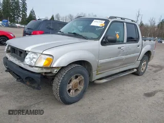 2003 Ford Explorer Sport Trac XLS z VIN 1FMZU77E93UA38468, wystawiony jako IAAI lot #41667956 z przebiegiem 291 806 mil mil oraz . Historia ofert i sprzedaży dostępna na DreamBid. Obrazek 2.