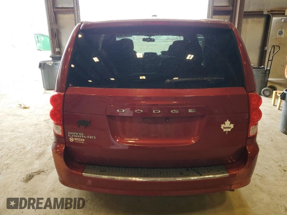 2014 Dodge Grand Caravan SE 30th Anniversary with VIN 2C4RDGBG4ER250658, listed as a Copart auction lot 54126535 with 85,980 mi miles and Non Repairable. Bid and sale history available at DreamBid. Image 6.