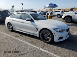 2015 BMW 4 Series 428i with VIN WBA4A9C59FGL87249, listed as a Copart auction lot 52182775 with 57,797 mi miles and Salvage title. Bid and sale history available at DreamBid. Image 4.