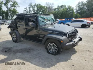 2016 Jeep Wrangler Unlimited Rubicon with VIN 1C4BJWFG7GL320650, listed as a Copart auction lot 53900195 with 77,620 mi miles and Salvage title. Bid and sale history available at DreamBid. Image 4.