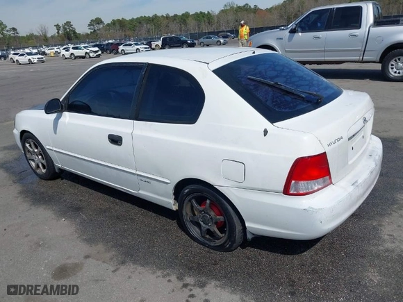 2002 Hyundai Accent GL with VIN KMHCG35C32U213819, listed as a IAAI auction lot 41834267 with 167,798 mi miles. Bid and sale history available at carsss.com. Image 3.