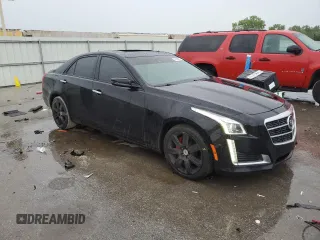2014 Cadillac CTS Premium AWD with VIN 1G6AZ5S37E0131094, listed as a Copart auction lot 59180975 with 119,592 mi miles and Salvage title. Bid and sale history available at DreamBid. Image 4.