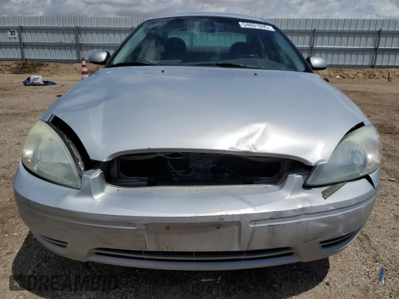 2007 Ford Taurus SEL z VIN 1FAFP56UX7A156005, wystawiony jako Copart lot #54691695 z przebiegiem 152 197 mil mil oraz Szkoda całkowita • Salvage title. Historia ofert i sprzedaży dostępna na DreamBid. Obrazek 5.