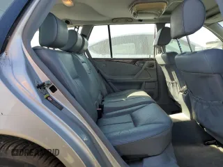 2001 Mercedes-Benz E-Class with VIN WDBJH65J01B276815, listed as a Copart auction lot 75748694 with 208,827 mi miles and Clean Title. Bid and sale history available at carsss.com. Image 10.
