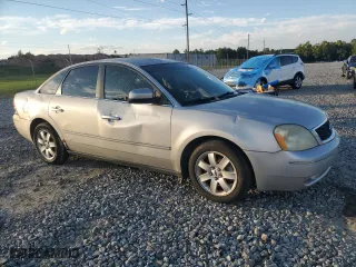 2006 Ford Five Hundred SEL with VIN 1FAFP24156G129524, listed as a Copart auction lot 73710504 with 221,311 mi miles and Salvage Title. Bid and sale history available at carsss.com. Image 4.