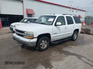 2003 Chevrolet Tahoe LS with VIN 1GNEC13T13R206573, listed as a IAAI auction lot 41931422 with 280,674 mi miles. Bid and sale history available at carsss.com. Image 2.