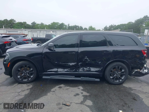 2022 Dodge Durango R/T Plus with VIN 1C4SDJCT8NC187003, listed as a IAAI auction lot 42409749 with 56,055 mi miles and . Bid and sale history available at DreamBid. Image 14.