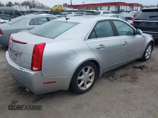 2008 Cadillac CTS AWD w/1SB with VIN 1G6DT57VX80174891, listed as a IAAI auction lot 39161303 with 116,089 mi miles. Bid and sale history available at carsss.com. Image 4.