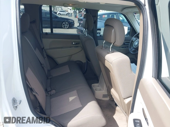 2011 Jeep Liberty Sport with VIN 1J4PN2GK5BW593786, listed as a IAAI auction lot 42161509 with 107,174 mi miles and . Bid and sale history available at DreamBid. Image 8.