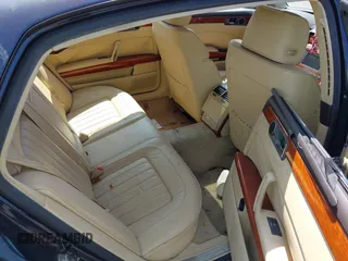 2005 Volkswagen Phaeton z VIN WVWAF03D058005435, wystawiony jako IAAI lot #41671418 z przebiegiem 87 199 mil mil oraz . Historia ofert i sprzedaży dostępna na DreamBid. Obrazek 8.