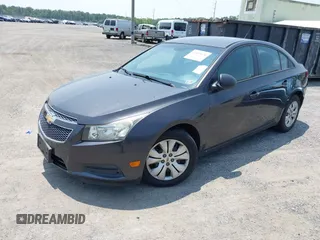 2014 Chevrolet Cruze LS z VIN 1G1PA5SG7E7143313, wystawiony jako IAAI lot #42435636 z przebiegiem Nie podano mil oraz . Historia ofert i sprzedaży dostępna na DreamBid. Obrazek 2.