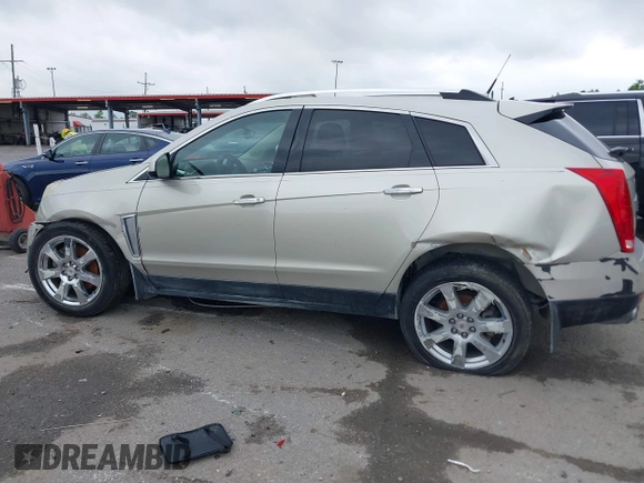 2014 Cadillac SRX Performance Collection z VIN 3GYFNCE35ES610504, wystawiony jako IAAI lot #42133548 z przebiegiem 140 306 mil mil oraz . Historia ofert i sprzedaży dostępna na DreamBid. Obrazek 14.