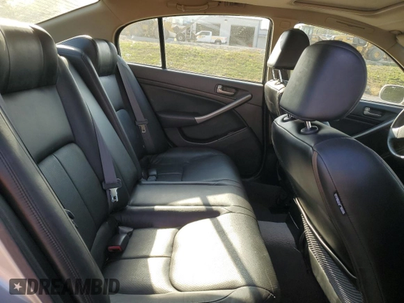 2004 Infiniti G35 w/Leather with VIN JNKCV51E24M111782, listed as a Copart auction lot 74676044 with 121,564 mi miles and Salvage Title. Bid and sale history available at DreamBid. Image 10.
