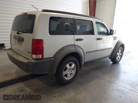 2007 Dodge Nitro SXT z VIN 1D8GT28K17W615978, wystawiony jako IAAI lot #41955211 z przebiegiem 142 741 mil mil oraz . Historia ofert i sprzedaży dostępna na DreamBid. Obrazek 4.