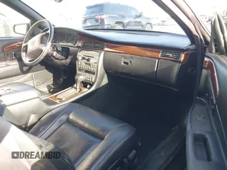1999 Cadillac Eldorado Touring z VIN 1G6ET129XXU603042, wystawiony jako IAAI lot #41699955 z przebiegiem 81 704 mil mil oraz . Historia ofert i sprzedaży dostępna na DreamBid. Obrazek 5.