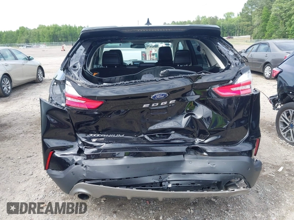 2021 Ford Edge Titanium z VIN 2FMPK3K99MBA16882, wystawiony jako IAAI lot #42214606 z przebiegiem 140 031 mil mil oraz . Historia ofert i sprzedaży dostępna na DreamBid. Obrazek 6.