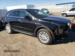 2024 Cadillac XT4 AWD Luxury with VIN 1GYFZBR41RF114434, listed as a Copart auction lot 73217514 with 10,505 mi miles and Salvage Title. Bid and sale history available at carsss.com. Image 4.