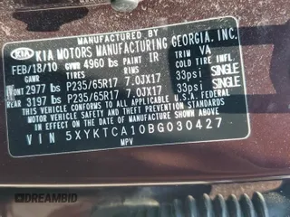 2011 Kia Sorento LX z VIN 5XYKTCA10BG030427, wystawiony jako Copart lot #60969435 z przebiegiem 129 960 mil mil oraz Czysty tytuł • Clean title. Historia ofert i sprzedaży dostępna na DreamBid. Obrazek 13.