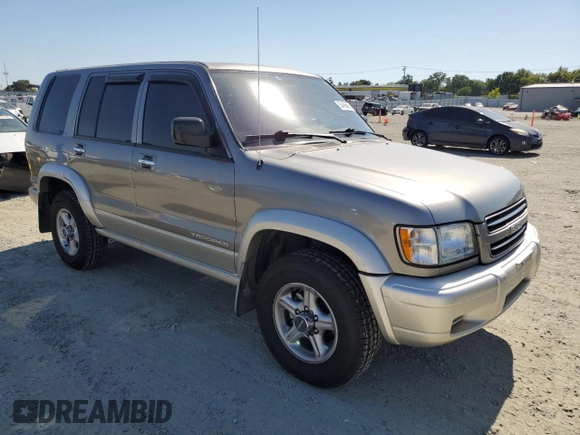 2001 Isuzu Trooper S with VIN JACDS58X817J03149, listed as a Copart auction lot 63456605 with 125,559 mi miles and Clean title. Bid and sale history available at DreamBid. Image 4.