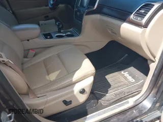 2014 Jeep Grand Cherokee Limited with VIN 1C4RJEBT6EC187548, listed as a IAAI auction lot 42210601 with 138,451 mi miles and . Bid and sale history available at DreamBid. Image 5.