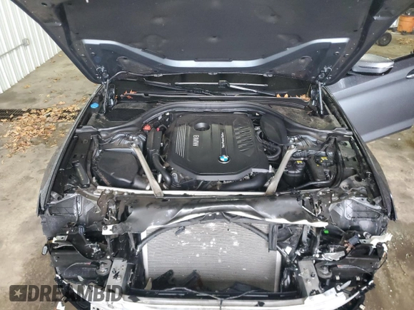 2018 BMW 5 Series 540i xDrive with VIN WBAJE7C59JWD52143, listed as a Copart auction lot 83438484 with 103,401 mi miles and Salvage title. Bid and sale history available at DreamBid. Image 11.