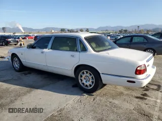 2001 Jaguar XJ with VIN SAJDA23C51LF35586, listed as a Copart auction lot 44105165 with 47,355 mi miles and Salvage title. Bid and sale history available at DreamBid. Image 2.