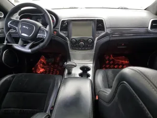 2015 Jeep Grand Cherokee SRT with VIN 1C4RJFDJ8FC919486, listed as a Copart auction lot 76821994 with 114,944 mi miles and Salvage Title. Bid and sale history available at carsss.com. Image 8.