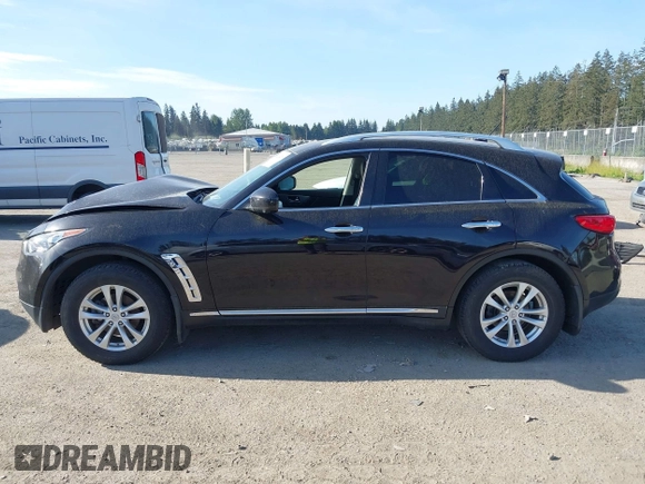 2013 Infiniti FX with VIN JN8CS1MW1DM171158, listed as a IAAI auction lot 42234300 with 142,710 mi miles and . Bid and sale history available at DreamBid. Image 14.
