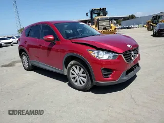 2016 Mazda CX-5 Sport with VIN JM3KE2BY8G0837203, listed as a Copart auction lot 54960845 with 116,656 mi miles and Salvage title. Bid and sale history available at DreamBid. Image 13.