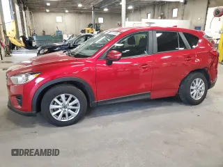 2016 Mazda CX-5 Touring z VIN JM3KE4CY7G0898598, wystawiony jako Copart lot #56717895 z przebiegiem 103 548 mil mil oraz Szkoda całkowita • Salvage title. Historia ofert i sprzedaży dostępna na DreamBid. Obrazek 1.