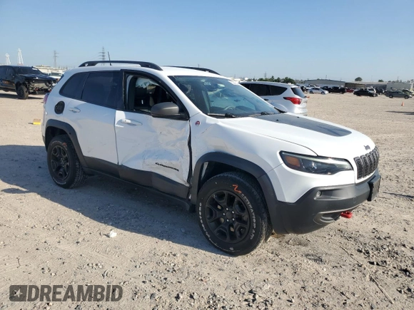 2019 Jeep Cherokee Trailhawk with VIN 1C4PJMBX9KD139200, listed as a Copart auction lot 52249605 with 71,879 mi miles and Salvage title. Bid and sale history available at DreamBid. Image 4.