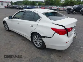 2014 Infiniti Q50 Sport with VIN JN1BV7AP5EM682486, listed as a IAAI auction lot 42286414 with 274,696 mi miles and . Bid and sale history available at DreamBid. Image 3.