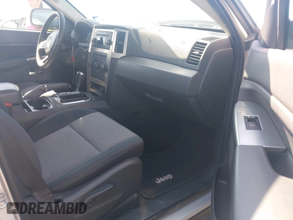 2010 Jeep Grand Cherokee Laredo with VIN 1J4PR4GK1AC143780, listed as a IAAI auction lot 42058575 with 88,608 mi miles. Bid and sale history available at carsss.com. Image 5.