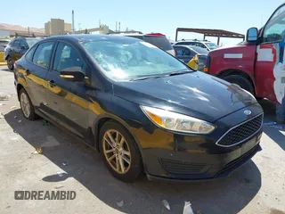 2017 Ford Focus SE z VIN 1FADP3F23HL223401, wystawiony jako IAAI lot #42639766 z przebiegiem 101 717 mil mil oraz . Historia ofert i sprzedaży dostępna na DreamBid. Obrazek 1.