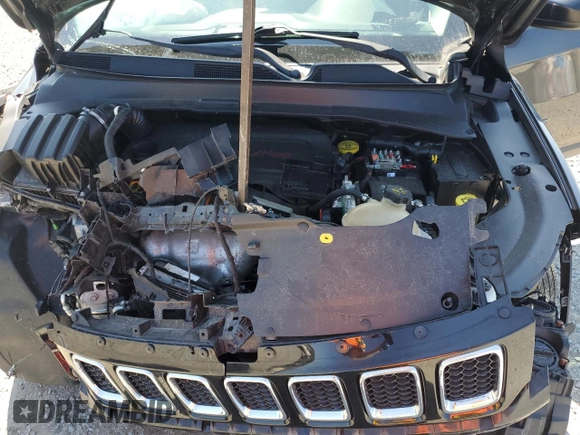 2018 Jeep Compass Sport with VIN 3C4NJCABXJT105430, listed as a Copart auction lot 59237575 with 104,600 mi miles and Salvage title. Bid and sale history available at DreamBid. Image 12.