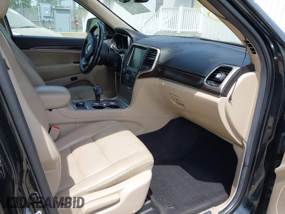 2014 Jeep Grand Cherokee Limited with VIN 1C4RJFBG3EC497939, listed as a IAAI auction lot 42127152 with 112,095 mi miles and . Bid and sale history available at DreamBid. Image 5.