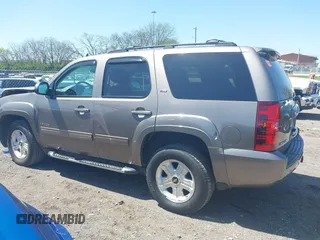 2013 Chevrolet Tahoe LT with VIN 1GNSKBE09DR325729, listed as a IAAI auction lot 41989587 with 186,361 mi miles and . Bid and sale history available at DreamBid. Image 14.