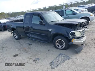 2003 Ford F-150 XL with VIN 1FTRX17W53NB19575, listed as a IAAI auction lot 41711599 with 1 mi miles. Bid and sale history available at carsss.com. Image 1.