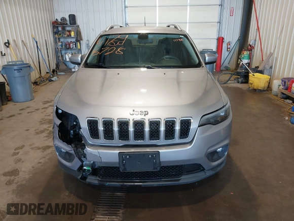 2019 Jeep Cherokee Latitude z VIN 1C4PJMCB0KD122398, wystawiony jako IAAI lot #41798728 z przebiegiem 117 810 mil mil oraz . Historia ofert i sprzedaży dostępna na DreamBid. Obrazek 12.