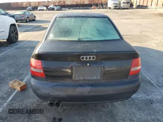 2001 Audi S4 z VIN WAURD68D41A135013, wystawiony jako Copart lot #48260185 z przebiegiem 164 053 mil mil oraz Tytuł czysty. Historia ofert i sprzedaży dostępna na DreamBid. Obrazek 6.