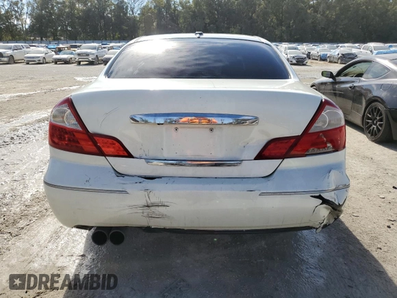 2005 Infiniti Q45 z VIN JNKBF01A85M100070, wystawiony jako Copart lot #82127494 z przebiegiem 176 578 mil mil oraz Szkoda całkowita • Salvage title. Historia ofert i sprzedaży dostępna na DreamBid. Obrazek 6.