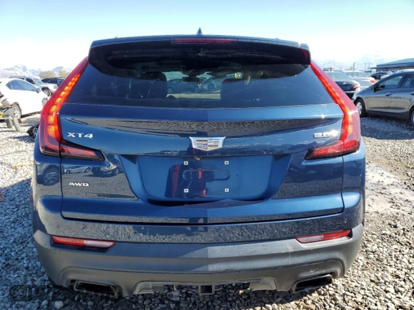 2019 Cadillac XT4 AWD Luxury with VIN 1GYFZBR49KF159269, listed as a Copart auction lot 77130474 with 35,883 mi miles and Salvage Title. Bid and sale history available at carsss.com. Image 6.