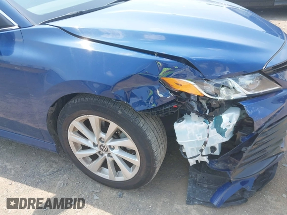 2023 Toyota Camry LE z VIN 4T1R11AK9PU180068, wystawiony jako IAAI lot #42483656 z przebiegiem 59 312 mil mil oraz . Historia ofert i sprzedaży dostępna na DreamBid. Obrazek 6.