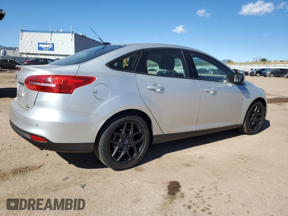 2016 Ford Focus SE with VIN 1FADP3F29GL314719, listed as a Copart auction lot 77686334 with 76,515 mi miles and Salvage title. Bid and sale history available at DreamBid. Image 3.