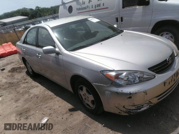 2003 Toyota Camry LE z VIN 4T1BF32K73U040558, wystawiony jako IAAI lot #42092091 z przebiegiem 179 949 mil mil oraz . Historia ofert i sprzedaży dostępna na DreamBid. Obrazek 1.