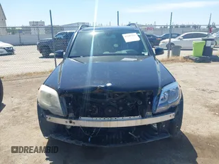 2013 Mercedes-Benz GLK with VIN WDCGG8JBXDG051067, listed as a IAAI auction lot 42107151 with 123,576 mi miles. Bid and sale history available at carsss.com. Image 13.
